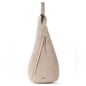 The Sak Geo Sling Backpack - Suede Leather in color Sand Minimalist